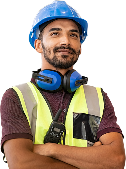 Construction employee with arms crossed in a hard hat